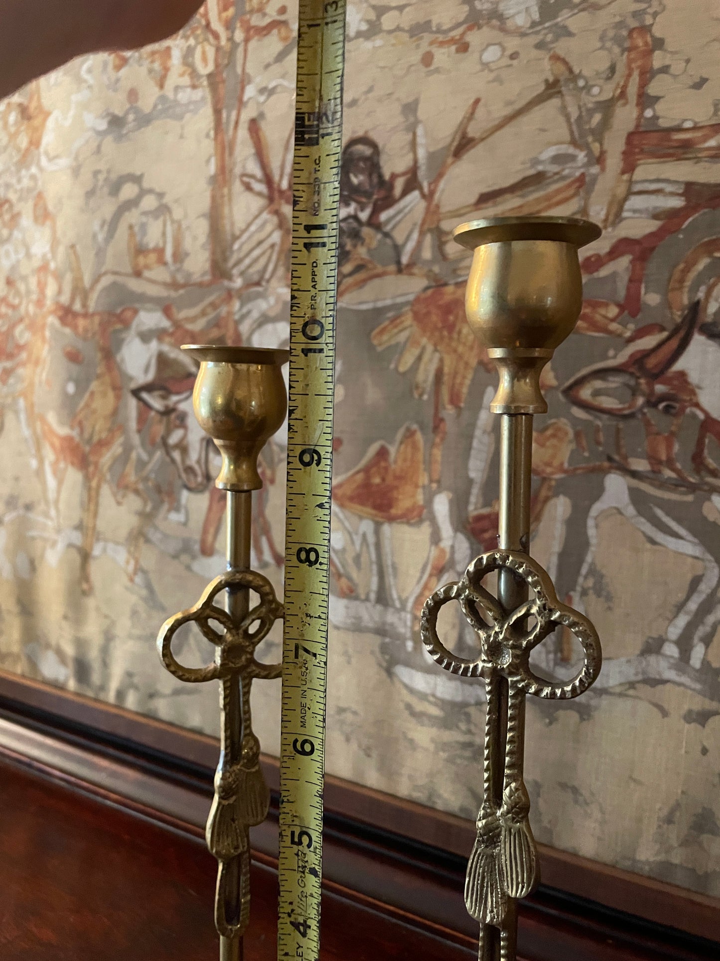 Pair of Tasseled Brass Candlesticks